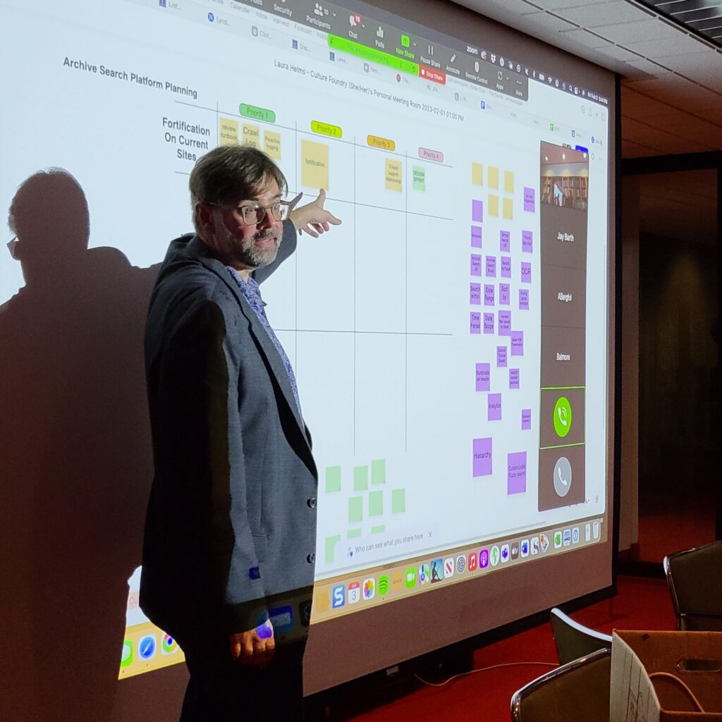 Culture Foundry CEO Hans Bjordahl reviews notes on a digital whiteboard during a Wayfinding Workshop at the LBJ Presidential Library